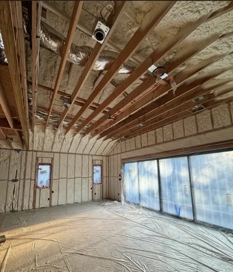 Interior walls and ceiling insulated with spray foam during new construction in Oxford